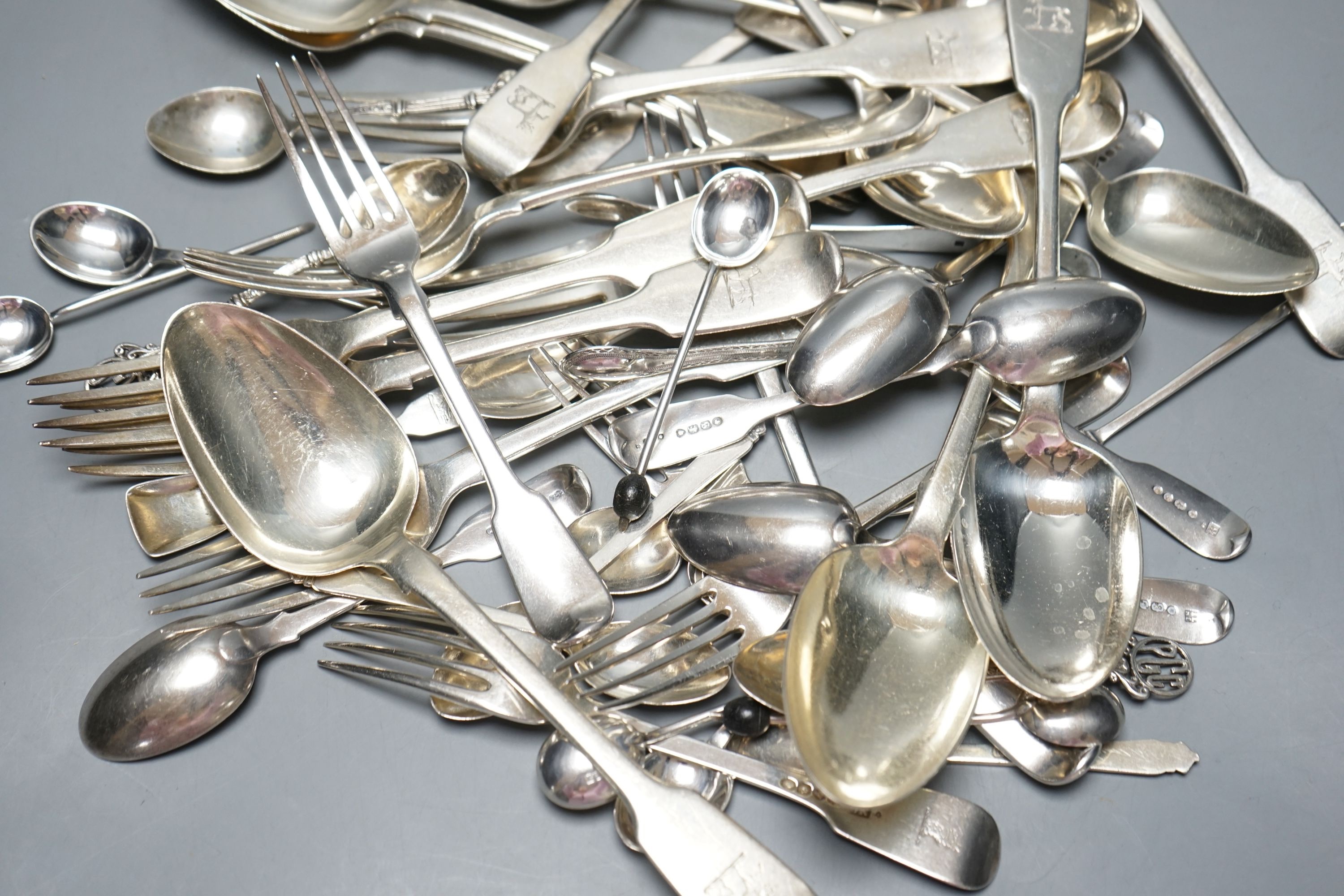 A set of six early Victorian Irish silver fiddle pattern table spoons, Philip Weekes, Dublin, 1844 and a quantity of assorted mainly 19th century flatware, various dates and makers